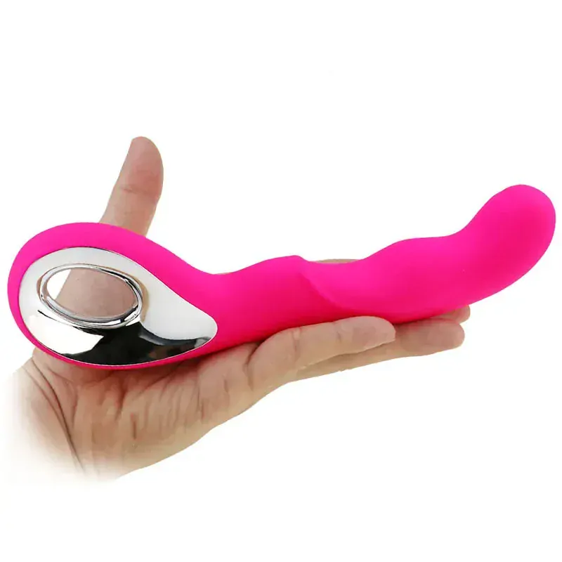 Zahnutý růžový vibrátor s rukojetí